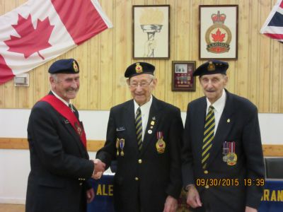 Comrades Don Lowe and Russell Bishop recieving their 70 year pins from Comrade President Peter Wyatt