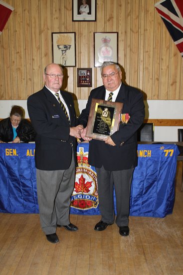 Comrade President Ed St. Pierre (R) recieving the 2008 Legionnare of the Year Award from 1st Vice President Comrade Larry Hamilton. (L)  (Photo provided by the News Review)